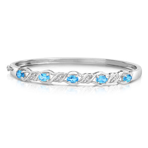 Blue Topaz and Diamond Accent Bangle Bracelet in Rhodium Plated Sterling Silver